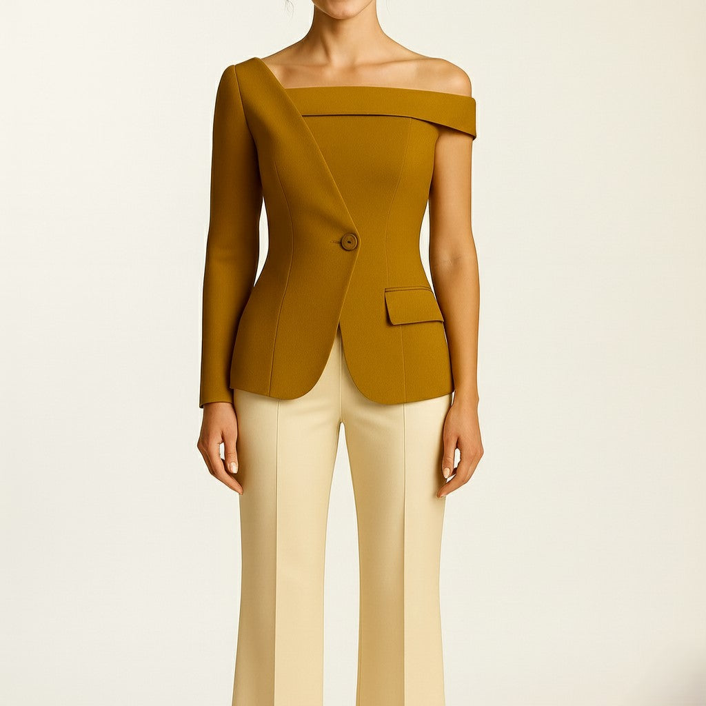 Asymmetrical cashmere top worn by a model on a plain background