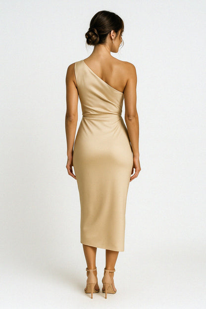 Woman wearing a silk one-shoulder dress.