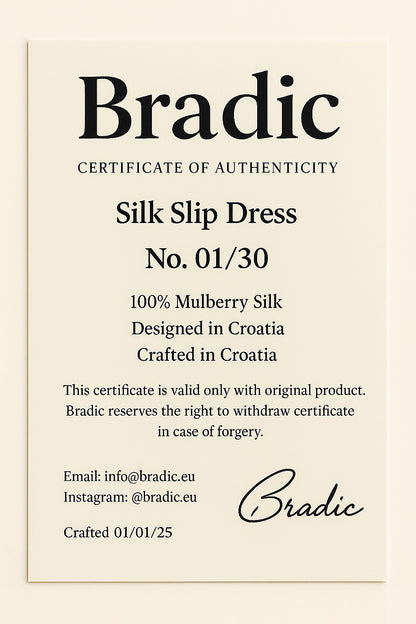 Bradic certificate of authenticity for a silk slip dress