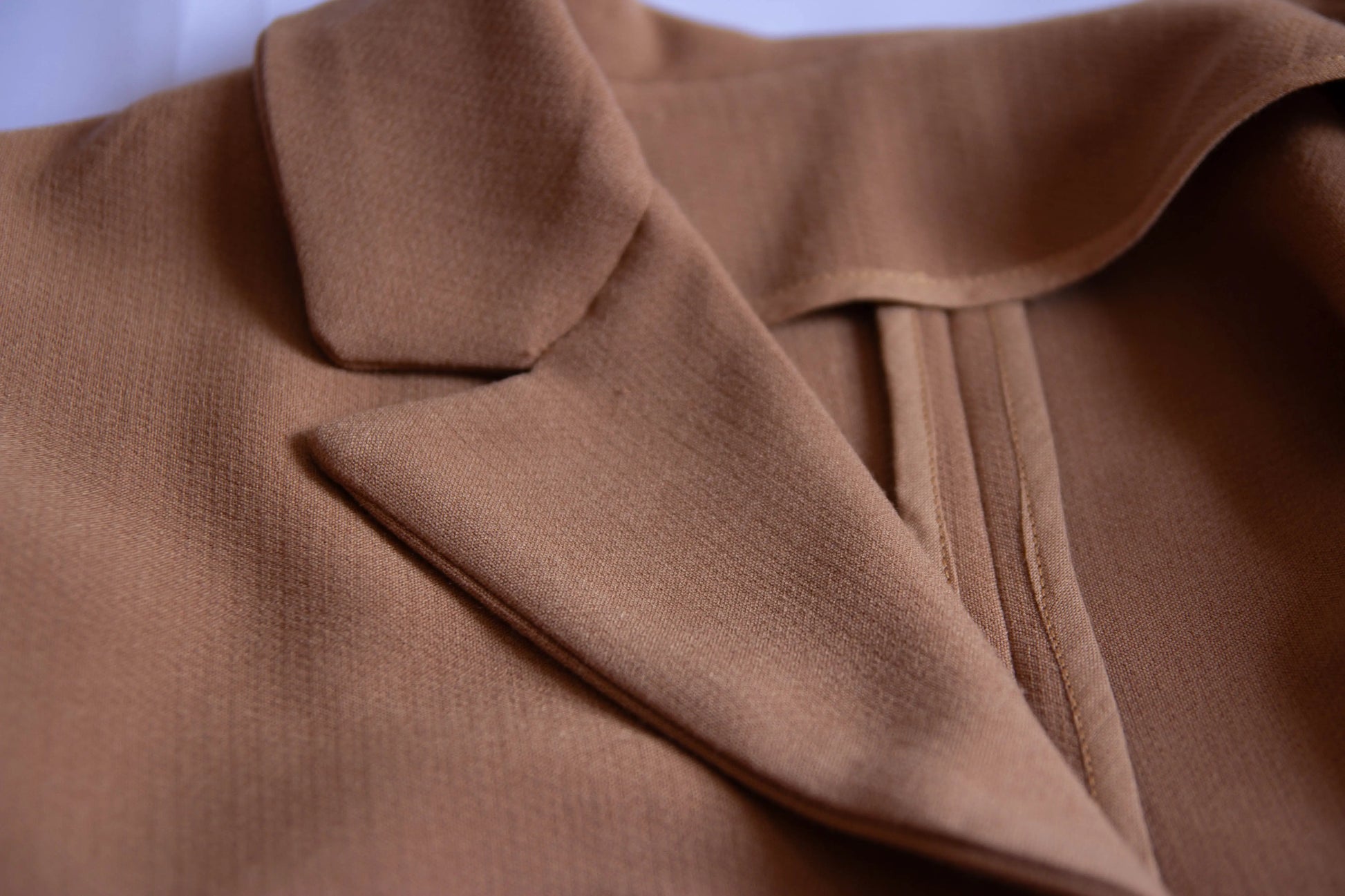 Close-up of a cropped wool jacket.
