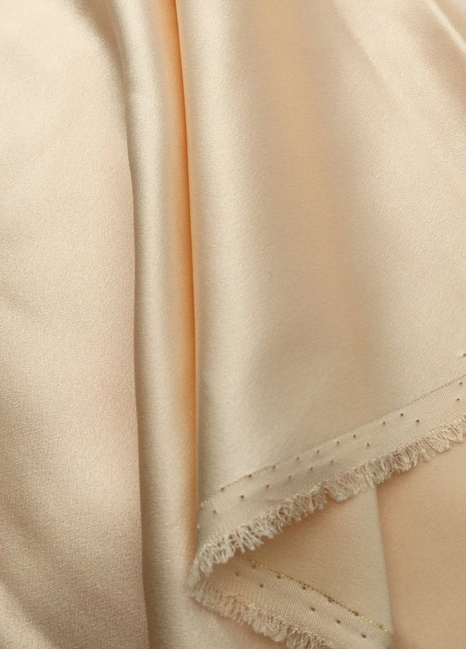 Close-up of champagne mulberry silk